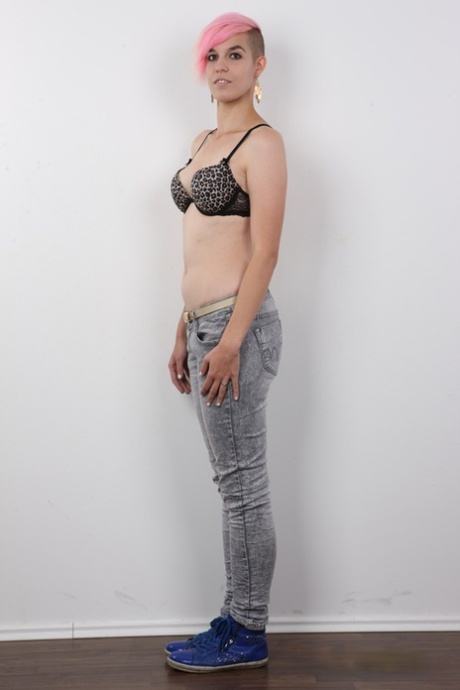 Amateur model Barbora sports pink hair while taking off all of her clothes