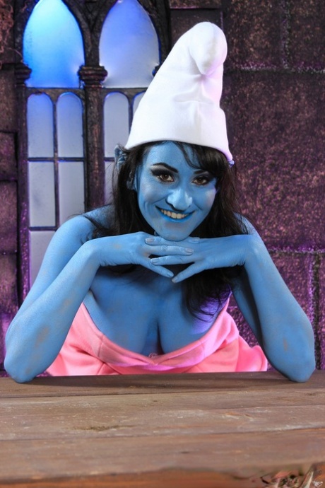 Latina chick Charley Chase shows off her girl parts in a Smurf outfit