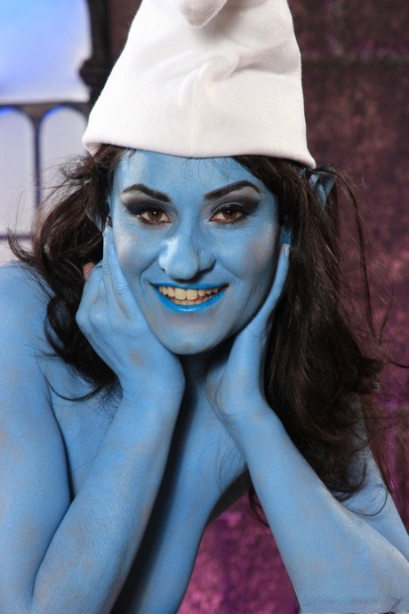 Latina chick Charley Chase shows off her girl parts in a Smurf outfit