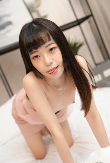 Chinese girl Yuli bangs a boy while her boyfriend sleeps in the same bed