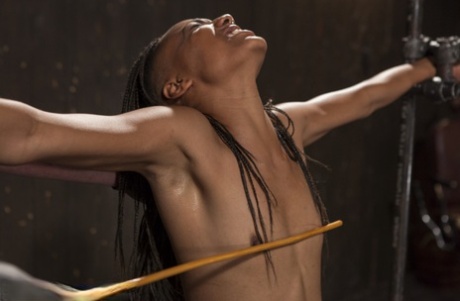 Restrained black girls squirt while being tortured by a male sadist