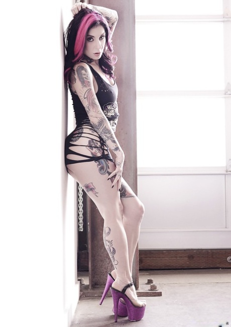Amateur MILF Joanna Angel showing off her heavily tattooed body in the nude