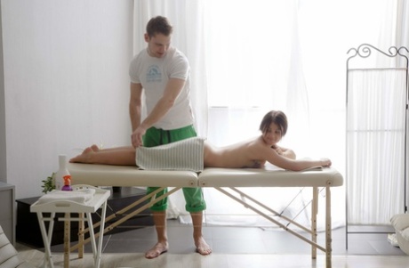 Teen Mackenzie lets her masseur fuck her in the ass after receiving a massage