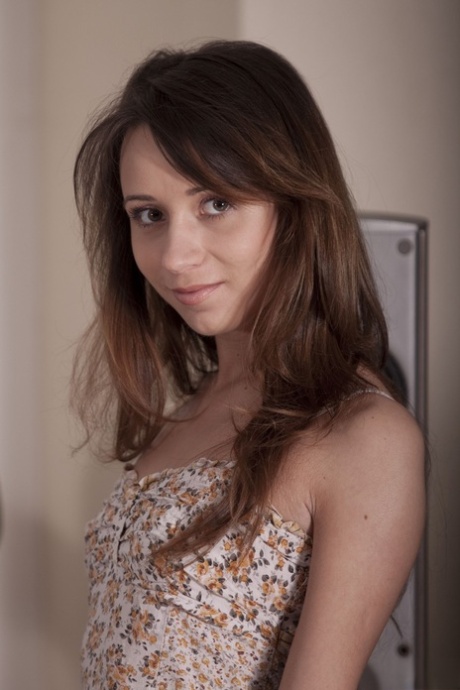 Innocent girl Inna isnt shy to undress and show her perky assets