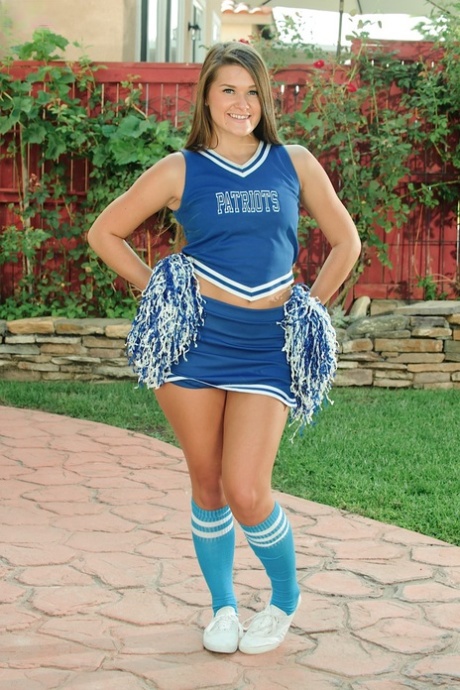 Naughty cheerleader Abby Rocks shows off her shaved pussy & her big booty