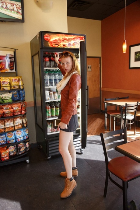 Cute teen with freckles Abby Vissers shows her natural tits at public places
