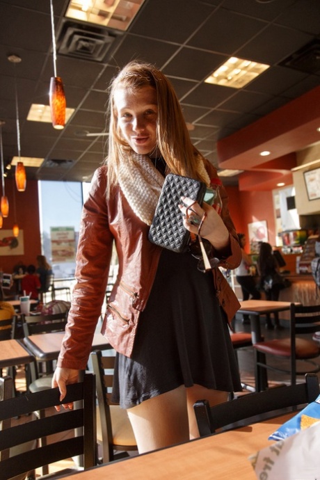 Cute teen with freckles Abby Vissers shows her natural tits at public places