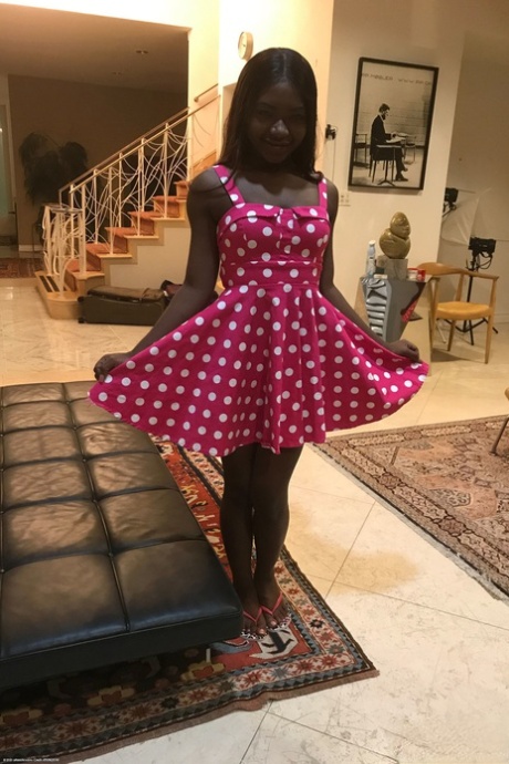 Little Afro-American teen Noemie Bilas shows her tits & choco holes in a solo
