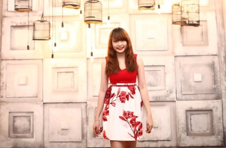Adorable Asian girl Autumn posing in her beautiful dresses in a compilation