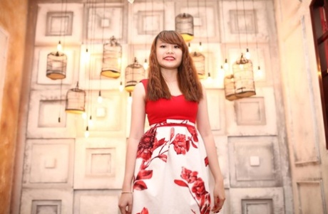 Adorable Asian girl Autumn posing in her beautiful dresses in a compilation