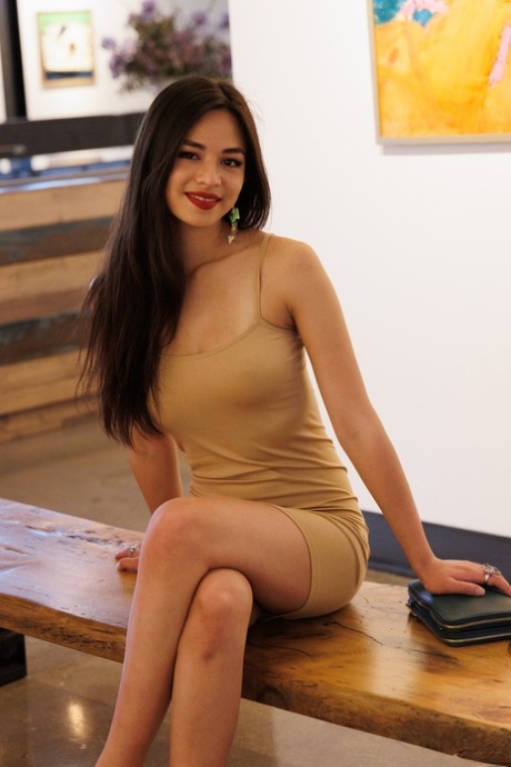 Petite babe Scarlett Alexis shows her hot legs wearing a sexy dress